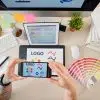 Designer Photographing Logotype