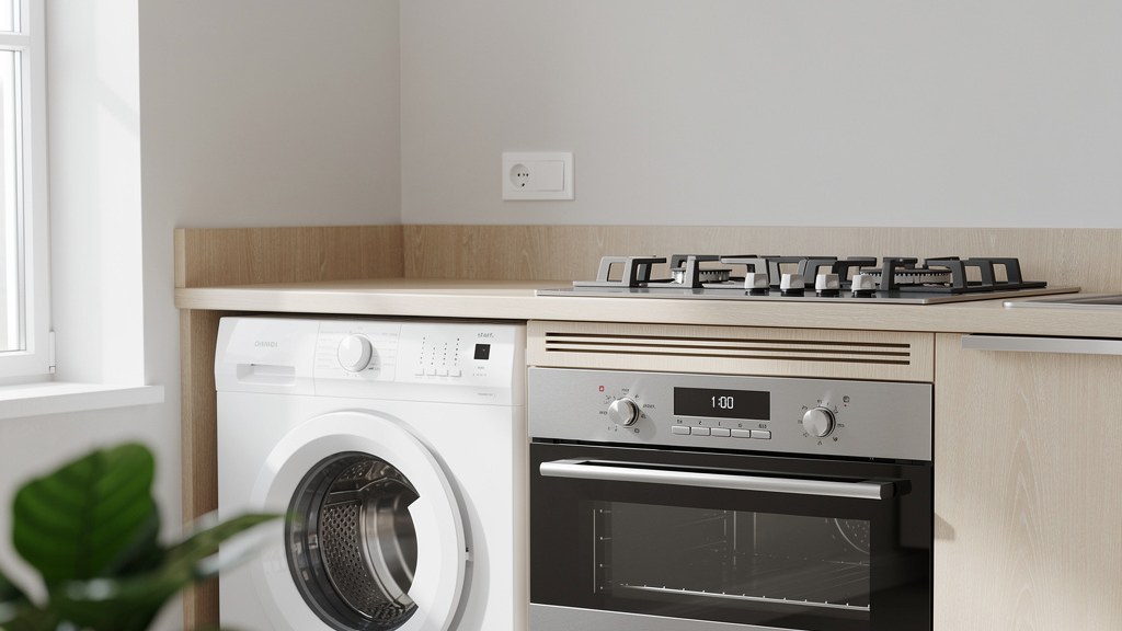 Lavadora De Carga Frontal Y Cocina a Gas En Una Lavandería Moderna Iluminada