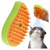 Green Oval Pet Grooming Brush with Orange Spiked Bristles Being Used on a Curious Cat for Brushing.