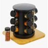 Rotating Spice Rack with Black-lidded Jars on a Wooden Base; a Small Chili Flakes Bottle Sits Beside It.