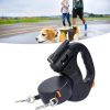 Retractable Dog Leash with Flashlight and Dual Clips; a Beagle Being Walked in the Background.