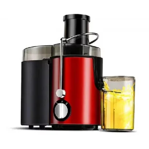Red and black juicer with a chrome top, shown with a glass of yellow juice beside it, on a white background (informative product shot).