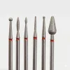 Six Dental Burs with Metal Shanks and Red Rings, Displaying Different Grinding and Shaping Tips Against a White Background.